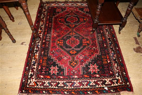 Small Oriental red ground rug